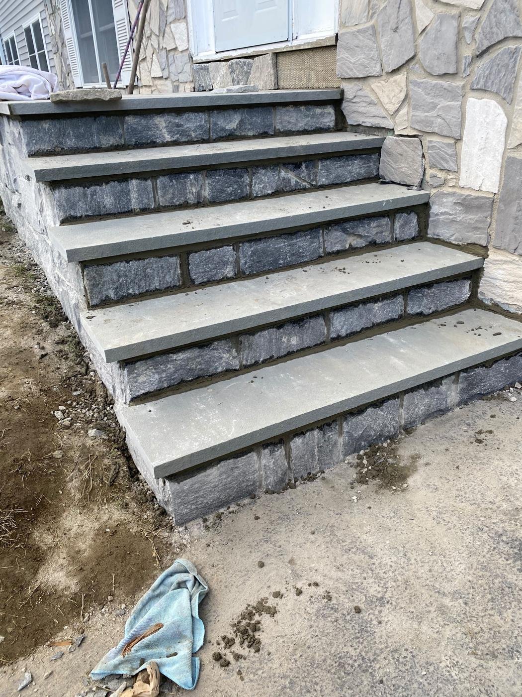Bluestone steps with stone risers by Tigre General Construction, Dutchess County NY
